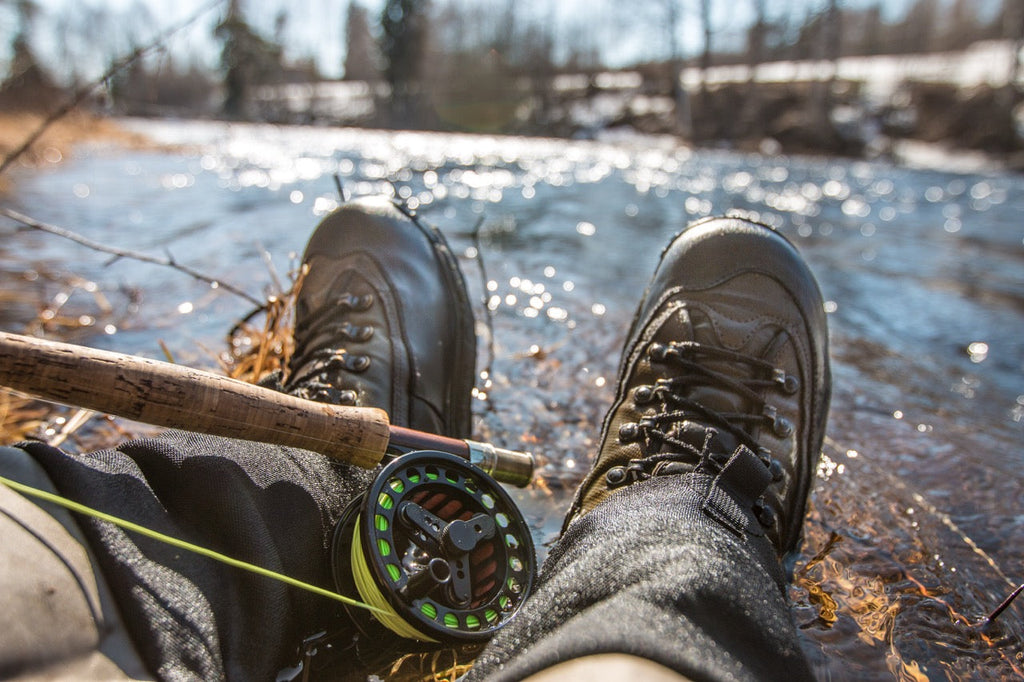 Sample Blog Post featuring fishing gear and wading gear at the river for an outdoor adventure.