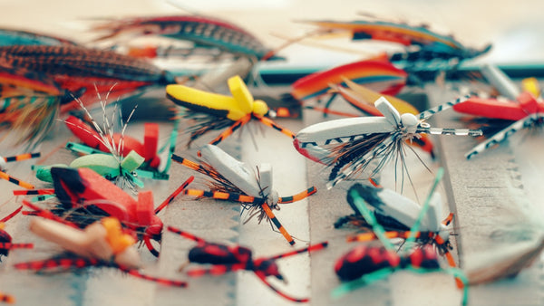 Colorful fly tying supplies for fishing gear.